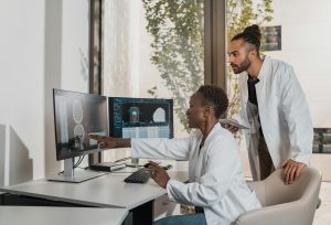 Doctors studying an MRI scan