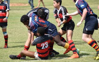 Children playing rugby